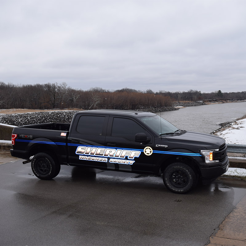 wagoner patrol car on bridge with snow