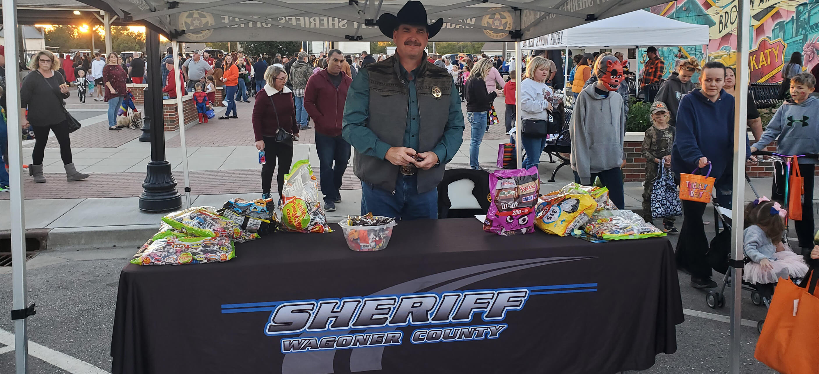 sheriff in booth at the wagoner fair